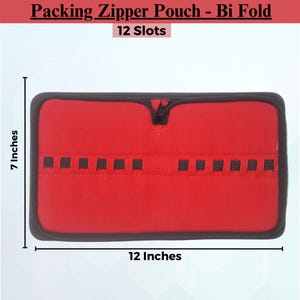 May include: Red zippered pouch with 12 slots for organizing small items. The pouch measures 12 inches wide and 7 inches tall.