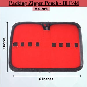 May include: Red zippered pouch with 8 slots for storing small items. The pouch is 6 inches tall and 8 inches wide.