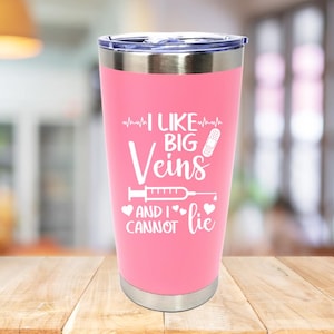 May include: Pink stainless steel travel mug with a white graphic that says "I like big veins and I cannot lie" with a heart, a syringe, and a bandage.
