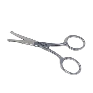 May include: Small, silver scissors with rounded finger holes. The scissors have a curved blade and the name "Jackie" is engraved on the handle. These scissors are designed for trimming.