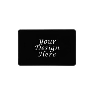 May include: A black rectangular card with rounded corners. The card features the text "Your Design Here" in a white, elegant script. The design is centered on the card, creating a clean and simple aesthetic.