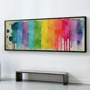 May include: A long rectangular canvas painting featuring vertical stripes of rainbow colours including teal, blue, purple, green, yellow, orange, red, and magenta. The paint application is textured with visible brushstrokes and drips.