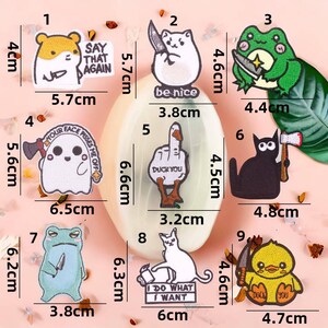Cartoon kat met mes borduurpatches - DIY dierenkikkerhoed schattige patches