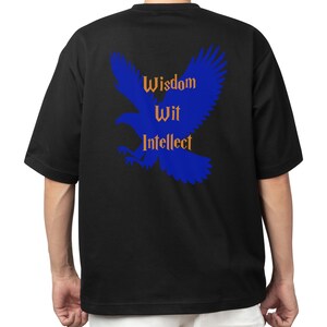 May include: Black t-shirt featuring a blue silhouette of a bird and the text "Wisdom Wit Intellect" in orange.