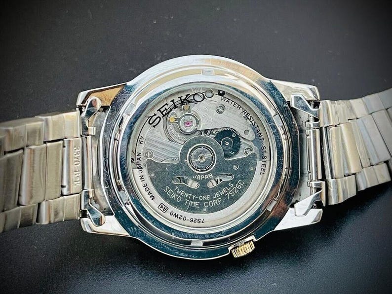 Montre Seiko Week Dater Automatique – 21 Rubis, Boîtier Doré, Occasion Authentique, Modèle 6619 7050