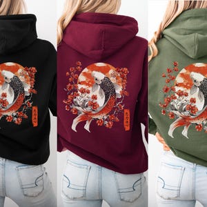 A Military Green Koi Fish Hoodie with a back & front print, featuring vintage Asian artwork & the Japanese cultural symbols of the Koi Fish, cherry blossoms, the Japanese sun and Kanji writing, with the symbols for Loyalty, Strength & Determination.