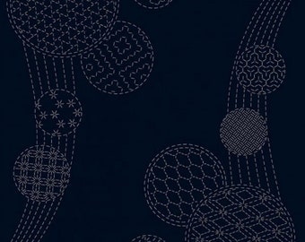May include: Dark navy blue background with white stitched circular patterns of varying sizes and designs. The patterns include geometric shapes and curved lines, creating a textured, artistic design.
