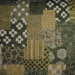 May include: A patchwork fabric featuring a range of green and brown patterns, including floral, geometric, and striped designs.