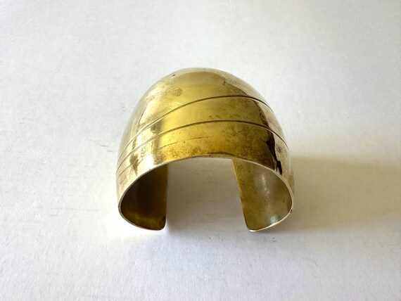 Solid gold colored bronze cuff bracelet with crea… - image 1