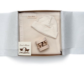 Best Baby Shower Gift Set - Finest Quality Organic Cotton Blanket with Baby Hat and Heirloom Rattle