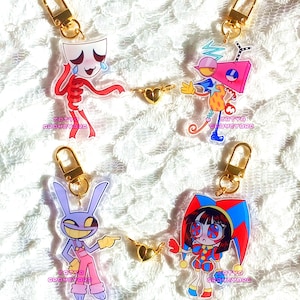 Llaveros magnéticos de corazón acrílicos de Digital Circus