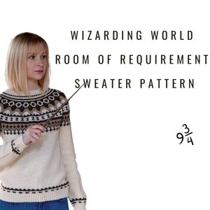 May include: A woman wearing a white sweater with a brown and black geometric pattern, holding a brown wand, pointing to the text "WIZARDING WORLD ROOM OF REQUIREMENT SWEATER PATTERN 9 3/4".