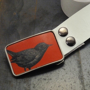 Red bird leather belt buckle, The southbound belt buckle