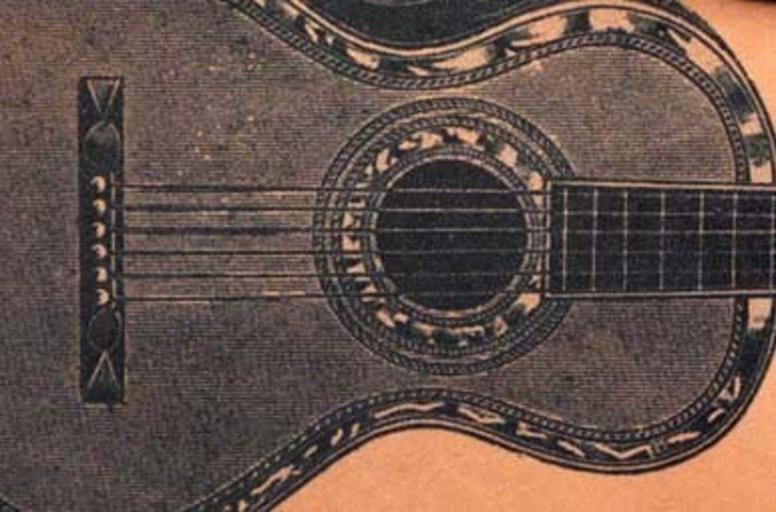 designer belt with guitar buckle