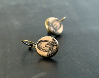 Boucles d'oreilles en cuir avec grande roue, clous The Flight Bound