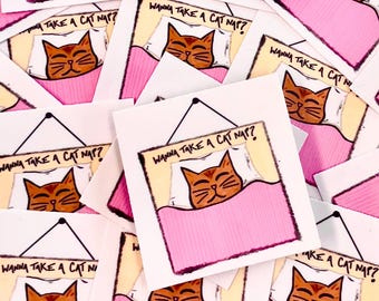 Puede incluir: Una pila de pegatinas rosas y blancas con un gato de dibujos animados durmiendo en una cama. Las pegatinas tienen el texto "Wanna take a cat nap?"