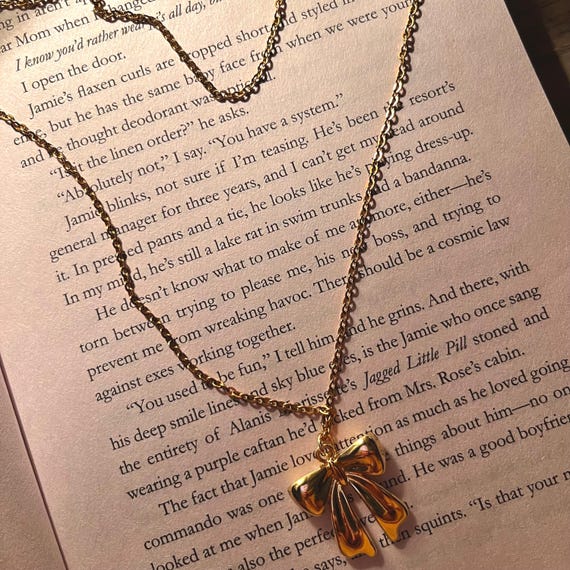 Collana con ciondolo con nodo a fiocco placcato oro 18 carati