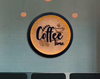 May include: A round wooden sign with a black frame and the words "Coffee Time" in a stylized font. The sign also features a coffee cup and coffee beans.