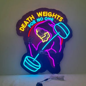 May include: Neon sign featuring a grim reaper lifting weights. The sign reads "DEATH WEIGHTS FOR NO ONE" in yellow neon. The reaper is outlined in pink and blue neon, with a yellow skull. The sign is black with a red lightning bolt.