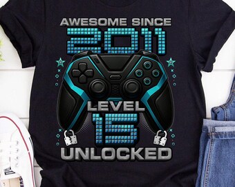 Maglietta sbloccata livello 15, maglietta per il 15° compleanno del giocatore, per ragazzo di 15 anni, maglietta di compleanno 15, maglietta fantastica dal 2011 per giocatori