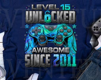 Maglietta sbloccata livello 15, maglietta per il 15° compleanno del giocatore, per ragazzo di 15 anni, maglietta di compleanno 15, maglietta fantastica dal 2011 per giocatori