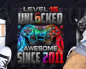 Maglietta sbloccata livello 15, maglietta per il 15° compleanno del giocatore, per ragazzo di 15 anni, maglietta di compleanno 15, maglietta fantastica dal 2011 per giocatori
