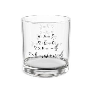 May include: A clear glass tumbler with a set of physics equations printed on the side. The equations include Maxwell's equations, which describe the behavior of electric and magnetic fields.