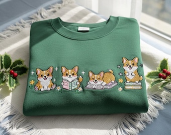 Sudadera floral con bordado de un Welsh Corgi leyendo, Sudadera con capucha para amantes de los libros, Suéter Corgi lector, Regalo acogedor para lectores, Sudadera con capucha para ratones de biblioteca