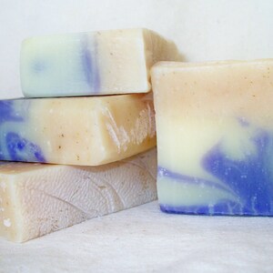 Handmade chamomile soap, a mild bar blended with chamomile and lavender for a calming, clean scent, hand beveled with smooth edges.