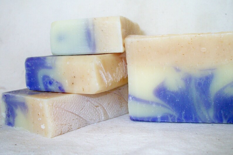 Handmade chamomile soap, a mild bar blended with chamomile and lavender for a calming, clean scent, hand beveled with smooth edges.