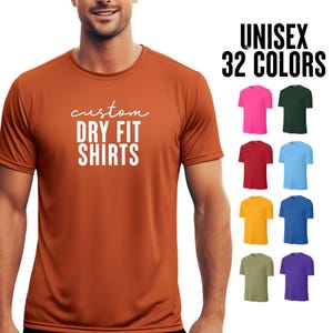 May include: An orange custom dry fit shirt is shown, with the text "custom DRY FIT SHIRTS" in white. The image also displays a selection of 32 shirt colours, including pink, red, yellow, and blue.
