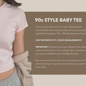 May include: A light pink baby tee with the text "90s STYLE BABY TEE". The shirt is a youth size for a classic baby tee style. The text on the image also recommends checking measurements for the perfect fit.