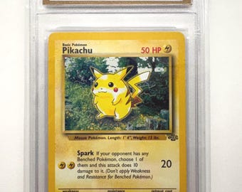 Authenticated 1999 Pokémon #60/64 Pikachu Jungle Set English Official Release TCT Graded NM-MT