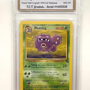 Authentifiziertes 1999 Pokémon #53/62 Weebling Fossilien Set Englische offizielle Version TCT Graded NM-MT