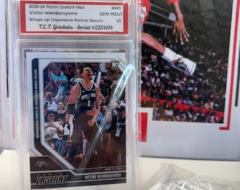 2023 Panini Instant #495 Victor Wembanyama Rookie Card “Impressive Rookie Season” T.C.T. Graded(TM) Gem Mint 10 with Stand