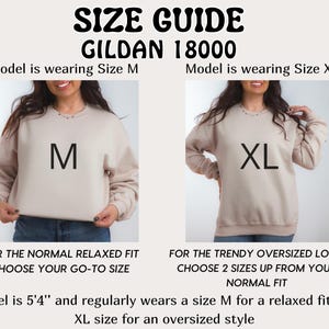May include: Size guide for Gildan 18000 sweatshirts. Two models are wearing the same sweatshirt in different sizes. The model on the left is wearing a size M and the model on the right is wearing a size XL. The text says "For the normal relaxed fit choose your go-to size" and "For the trendy oversized look choose 2 sizes up from your normal fit". The text also says "Model is 5'4" and regularly wears a size M for a relaxed fit and XL size for an oversized style."
