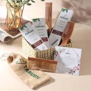 May include: A selection of wooden combs and accessories, including a handle comb, tall comb, and a drawstring bag. The combs are packaged in white boxes with green accents and the text "TARUSH NEEM WOOD COMB".