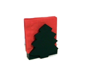 May include: A Christmas-themed napkin holder with a dark green tree-shaped cutout. The holder contains a stack of red napkins. The design is simple and festive, perfect for holiday gatherings.