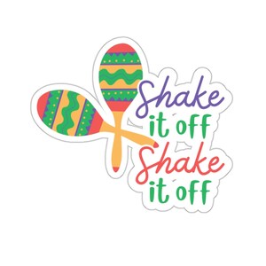 Pode incluir: Um adesivo com duas maracas e o texto "Shake it off Shake it off" em letras roxas, vermelhas e verdes.