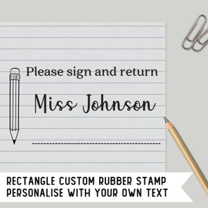 May include: Black and white custom rubber stamp with the text "Please sign and return Miss Johnson" and a pencil illustration. The stamp is designed to be personalised with your own text.