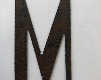 Vintage industrial letter M W