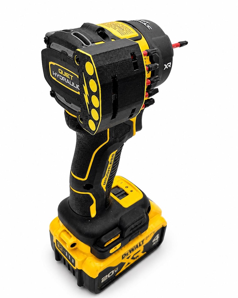 May include: A black and yellow cordless impact wrench with the text "QUIET HYDRAULIC" and "BRUSHLESS". The tool has a yellow battery pack with the text "DEWALT" and "20V".