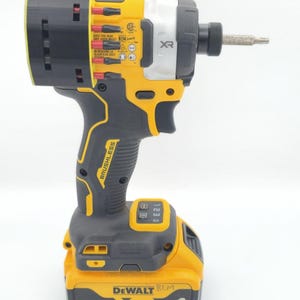 May include: A yellow and black DeWalt XR brushless impact driver with a silver head and a black battery. The tool has a black handle and a silver bit attached. The battery reads "20V XR 4 AH".