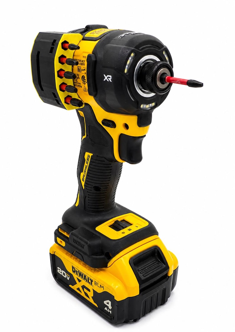 May include: A black and yellow cordless impact driver with a red bit. The tool has the text "BRUSHLESS" and "20V XR" printed on it. The battery is labeled "4 AH".