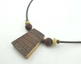 Reversible Bronze Necklace with Undeciphered Scripts