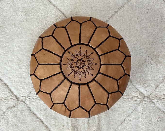 Handcrafted Red Leather Pouf .Authentic Moroccan Design for Stylish Comfort and Versatile Decor.