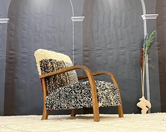 Boho Chic Multicolor Textured Armchair with Wooden Frame | ModernEclectic, BohoChic, StylishFurniture, UniqueDesign, AccentChair
