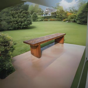 May include: A wooden bench with a natural finish sits on a light brown patio. The bench is made of rough-hewn planks and has a simple, rustic design. The bench is positioned in front of a green lawn with a house in the background.