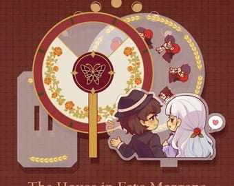 May include: A phenakistoscope featuring a circular disc with a butterfly emblem and rose patterns, accompanied by an acrylic stand depicting two characters, one with brown hair and a hat, the other with long white hair, labelled The House in Fata Morgana.