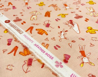 Half Yard cut of Lucky Rabbit Clothes Toss fabric in pink